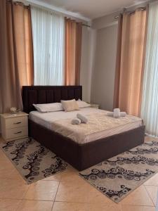 Ένα ή περισσότερα κρεβάτια σε δωμάτιο στο KU&NA HOTEL BELSH