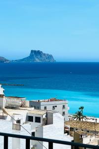 a view of the ocean from a balcony at Casa Pepita in Altea