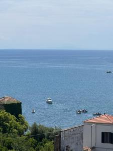 a group of boats in a large body of water at La Vista Formia B&B in Formia