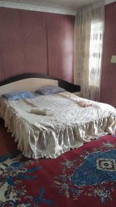 Postel nebo postele na pokoji v ubytování Guest House Tengo
