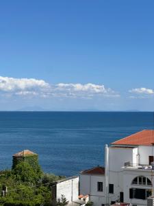 a view of the ocean from a building at La Vista Formia B&B in Formia