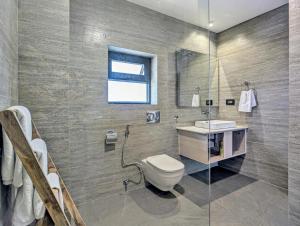 Ein Badezimmer in der Unterkunft Uma Residence and Suites