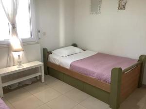 Ένα ή περισσότερα κρεβάτια σε δωμάτιο στο ΄΄Αdonis home''