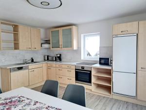 Kuchyň nebo kuchyňský kout v ubytování Ferienwohnung Kapar