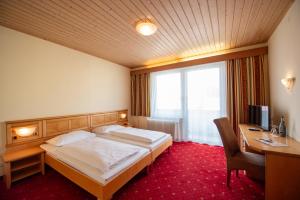 Postel nebo postele na pokoji v ubytování AKTIVHOTEL Weisser Hirsch