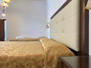Posteľ alebo postele v izbe v ubytovaní Hotel Soleado