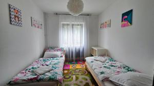Voodi või voodid majutusasutuse Ciao Bambino! toas