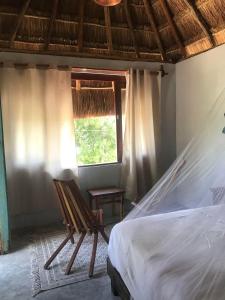 Postel nebo postele na pokoji v ubytování Casa Ik en Coba