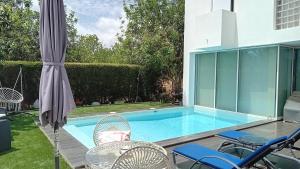 Bazén v ubytování Tavira independent suite with Pool at Casa Reflexos nebo v jeho okolí