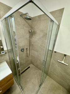 Koupelna v ubytování Enna Apartment A Meerblick perfect location + 37 fotografií