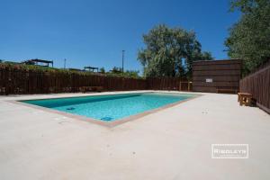 Bazén v ubytovaní Villa T3 climatisée en résidence avec piscine alebo v jeho blízkosti