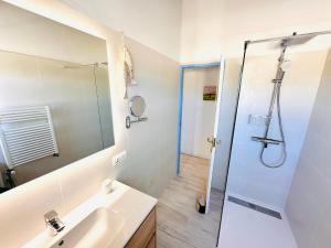 a bathroom with a shower and a sink at Casa Stefi - Astbury Formentera in Es Arenals +20 photos