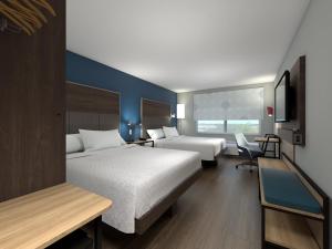 a hotel room with two beds and a window at Tru By Hilton Harrisonburg, Va in Harrisonburg