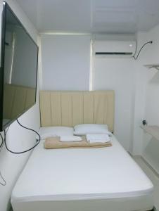 Postel nebo postele na pokoji v ubytování Hostel HA LUXURY