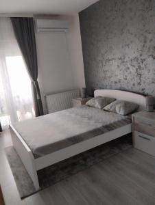 Postel nebo postele na pokoji v ubytování Apartman Lenka