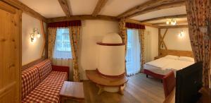 Posteľ alebo postele v izbe v ubytovaní Hotel Laurin