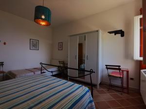 Łóżko lub łóżka w pokoju w obiekcie Bouganville Home