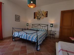 Łóżko lub łóżka w pokoju w obiekcie Bouganville Home