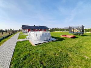Ο χώρος παιχνιδιού για παιδιά στο Domki Valhalla Polna 8a Chłopy Sarbinowo +20 φωτογραφίες