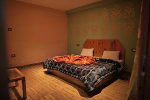 Yellowjackets Hostel Tosh客房内的一张或多张床位