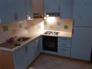 Η κουζίνα ή μικρή κουζίνα στο Rispescia Casa Vacanze Grosseto +18 φωτογραφίες