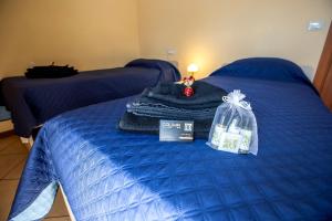 Postel nebo postele na pokoji v ubytování B&B Calima - - completo relax