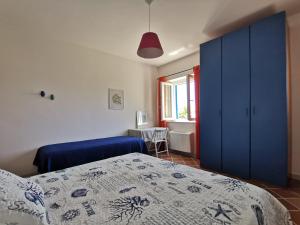 Łóżko lub łóżka w pokoju w obiekcie Bouganville Home