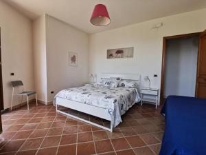 Łóżko lub łóżka w pokoju w obiekcie Bouganville Home