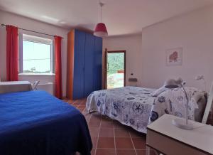 Łóżko lub łóżka w pokoju w obiekcie Bouganville Home
