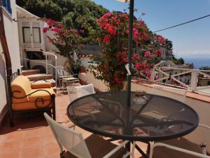 Balkon lub taras w obiekcie Bouganville Home