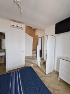 Postel nebo postele na pokoji v ubytování Il paradiso sul mare