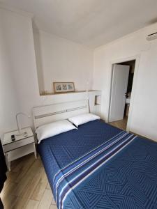 Postel nebo postele na pokoji v ubytování Il paradiso sul mare