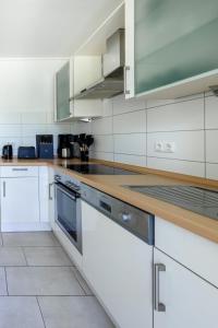 Köök või kööginurk majutusasutuses Ferienwohnung Liegeplatz