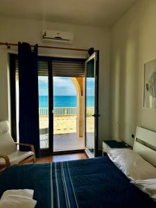 Postel nebo postele na pokoji v ubytování Il paradiso sul mare + 37 fotografií