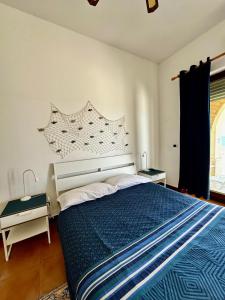 Postel nebo postele na pokoji v ubytování Il paradiso sul mare