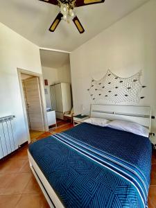 Postel nebo postele na pokoji v ubytování Il paradiso sul mare