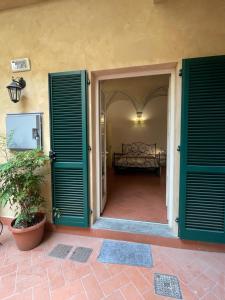 Postel nebo postele na pokoji v ubytování BonConvento Guesthouse - HiTuscany