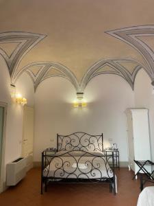 Postel nebo postele na pokoji v ubytování BonConvento Guesthouse - HiTuscany