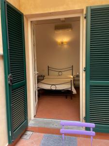Postel nebo postele na pokoji v ubytování BonConvento Guesthouse - HiTuscany