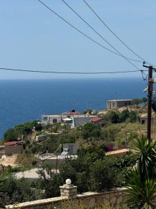 a view of the ocean from a house at Vila Bedro in Sarandë