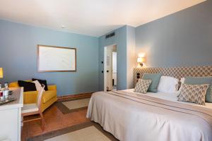 Postel nebo postele na pokoji v ubytování Cappuccina Country Resort