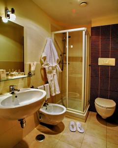 Ett badrum på Hotel Sisto V
