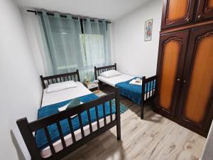 Postelja oz. postelje v sobi nastanitve Apartmani, sobe Žiža