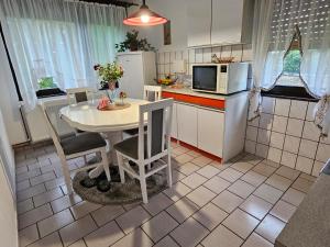 Kuchyň nebo kuchyňský kout v ubytování Apartmani, sobe Žiža + 28 fotografií
