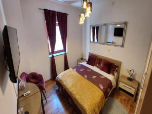 Postel nebo postele na pokoji v ubytování 4 Colors Rooms, Cres