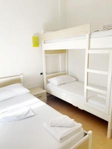 Postel nebo postele na pokoji v ubytování Hotel Prestige