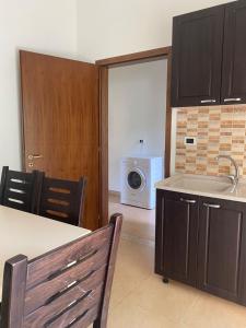 Kuchyň nebo kuchyňský kout v ubytování Hotel Prestige