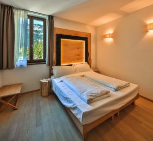 Postel nebo postele na pokoji v ubytování Albergo Caffe Centrale + 37 fotografií