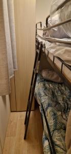 Postel nebo postele na pokoji v ubytování Mobile home C189