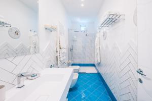 Salle de bains dans l'établissement Palazzo Pascal